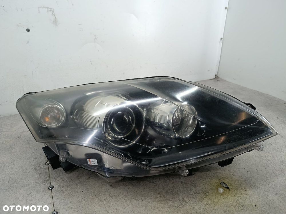LAMPA PRZÓD PRAWA XENON RENAULT LAGUNA III 260100043R 89902279 89034934 - 5