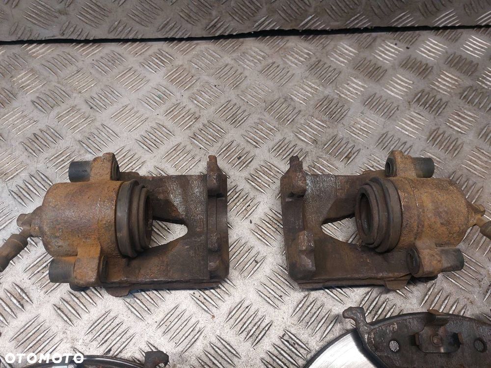 TARCZE HAMULCOWE PRZÓD + KLOCKI + ZACISKI SKODA OCTAVIA II LIFT 1.9 TDI - 4