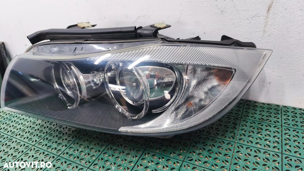 Far Bixenon BMW E90/91 2004-2008 NFL de europa complete 6942738 6942737 pretul este pe bucata - 2