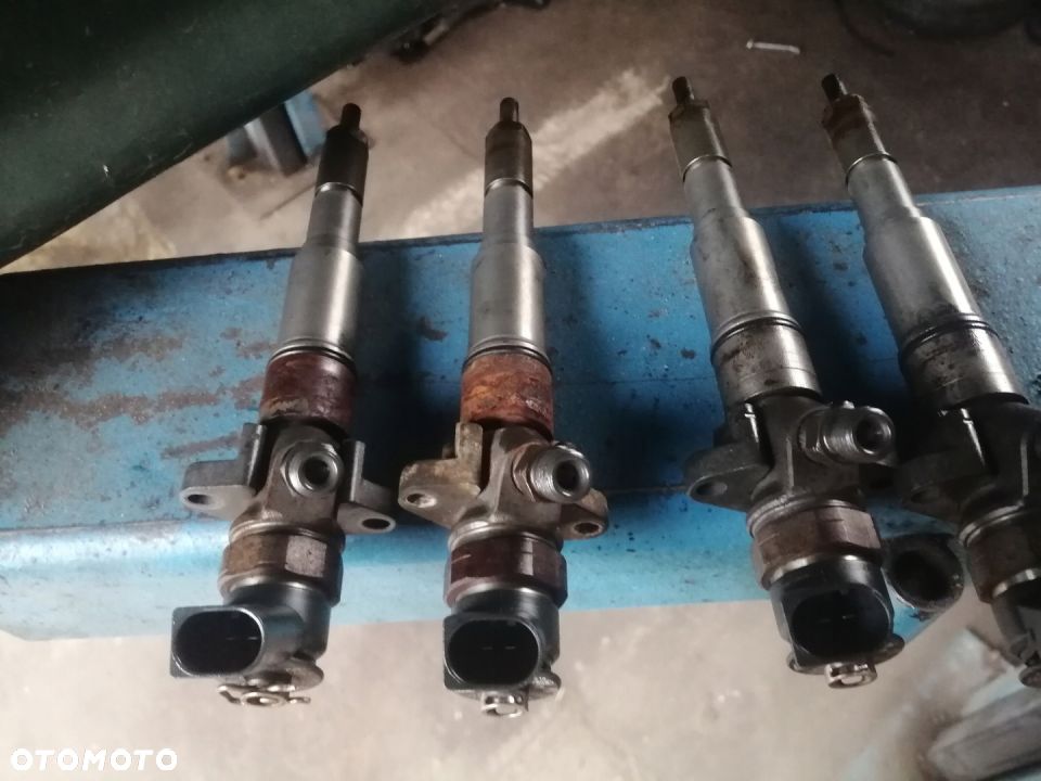 BMW E87 E46 E90 x5 WTRYSKIWACZ 0445110216 - 2