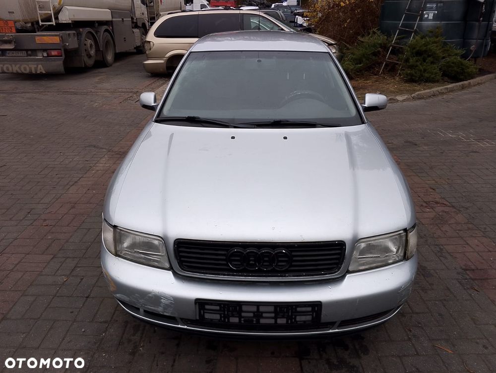 Audi A4 B5 (94-97r.) 1.6 B 100KM. Silnik AHL Skrzynia DCM lakier LY7M. Cały na części. GWARANCJA !!!  Przód Tył Zestaw Komplet Drzwi Klapa Zderzak Błotnik Maska Grill Atrapa Szyba Pas Lampa Lusterko Boczki Fotel Kanapa Kokpit Deska Rozdzielcza Przełącznik Włącznik Sterownik Przewody Wiązka Instalacja Moduł Komputer Czujnik Listwa Pompa Alternator Wtryski Głowica Rozrusznik Kompresor Sprzęgło Dwumas Silnik Skrzynia ABS Klimatyzacji Paliwa Wspomagania Kolektor Turbina Przepustnica Zawór Chłodnica Koło Hak Belka Sanki Zawieszenie Mcpherson Półoś Amortyzator Wydech Tłumik Zacisk Most - 2