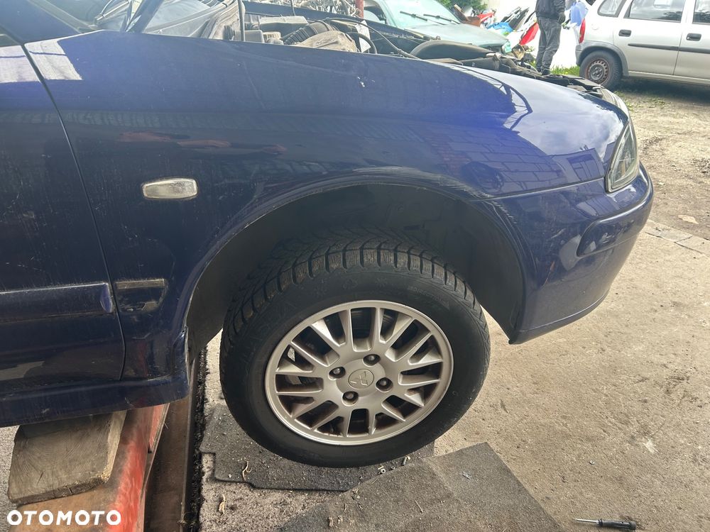 Błotnik prawy Mitsubishi Carisma lift T18