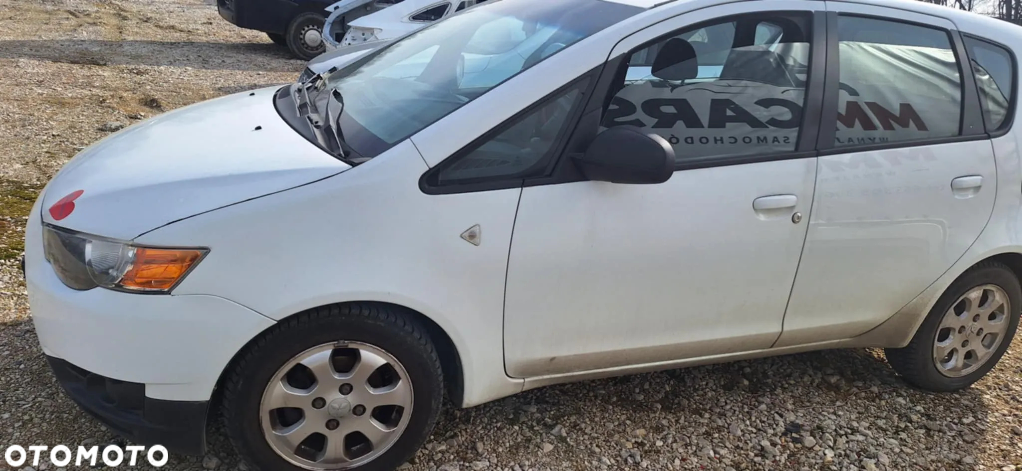 Mitsubishi COLT VI LIFT 1,1 75KM piasta zwrotnica lewy przód - 4