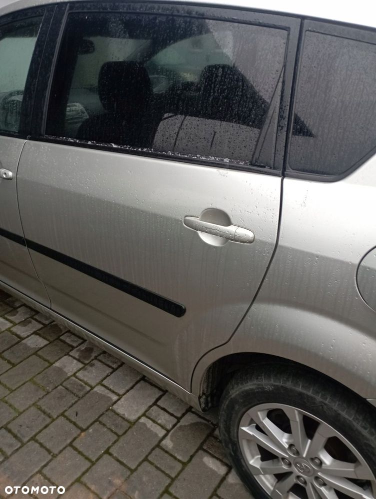 TOYOTA COROLLA VERSO II DRZWI LEWE TYŁ TYLNE GOŁE - 1