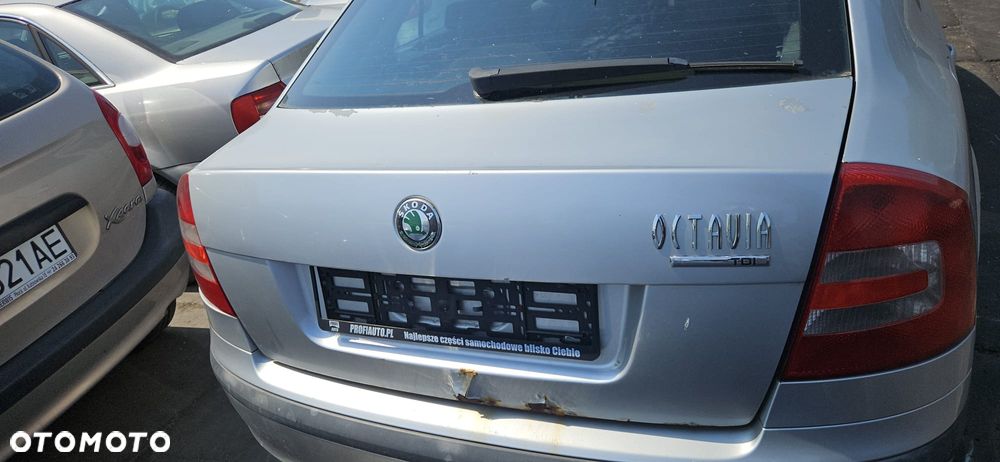 SKODA OCTAVIA II  04-08 1.9 TDI BKC - OSLONA PRZECIWSLONECZNA LEWA PRAWA - 24
