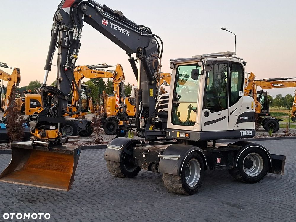 Terex SCHAEFF TW85 ROTOTILT ze szczypcami - 1