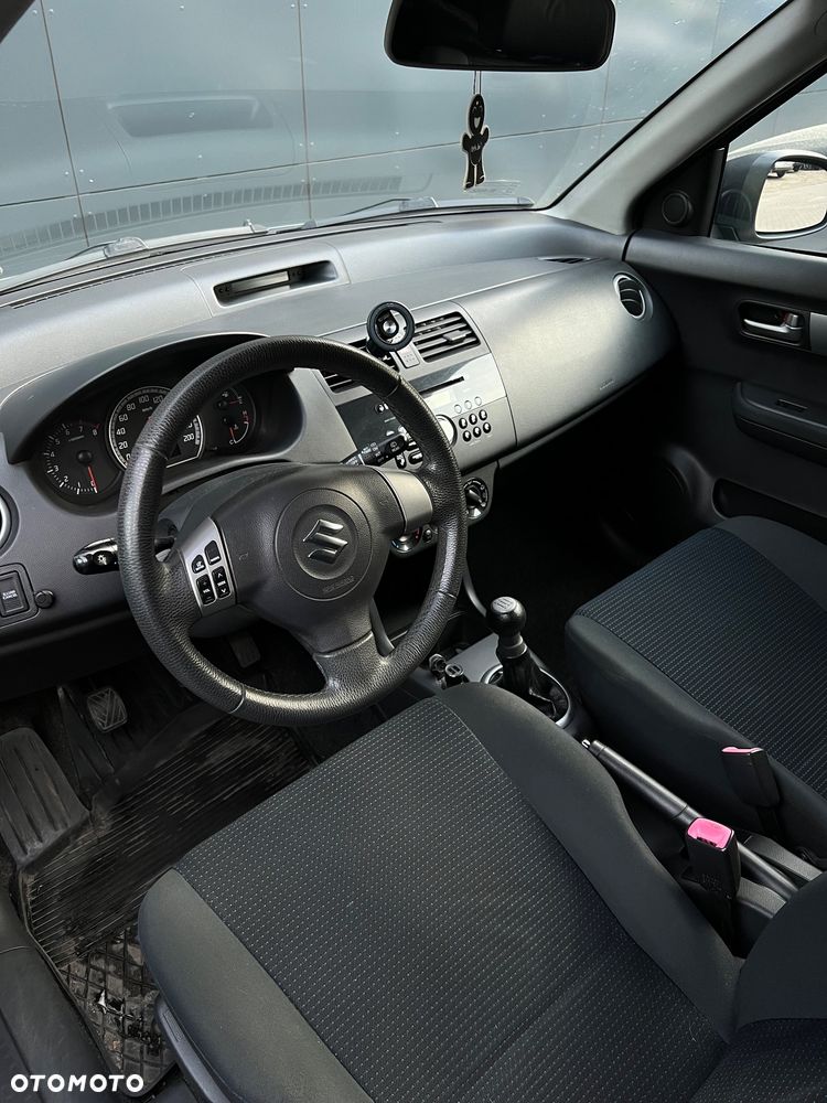 Suzuki Swift 1.3 Club - 10