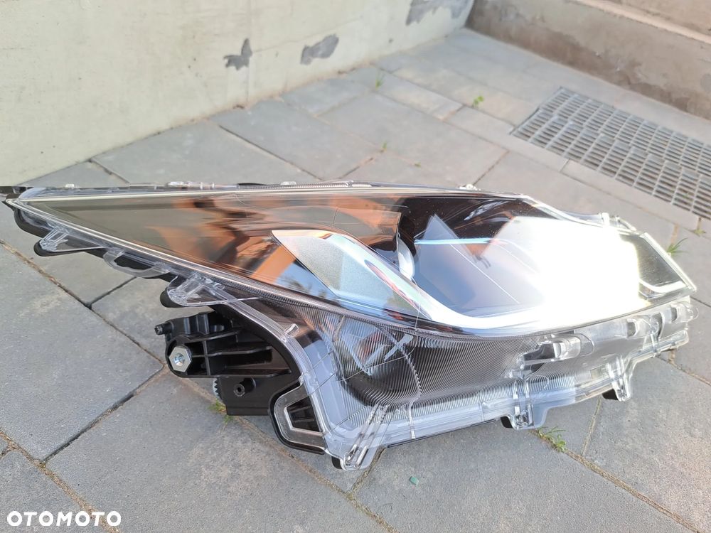Reflektor prawy Toyota Corolla E21 , - 2