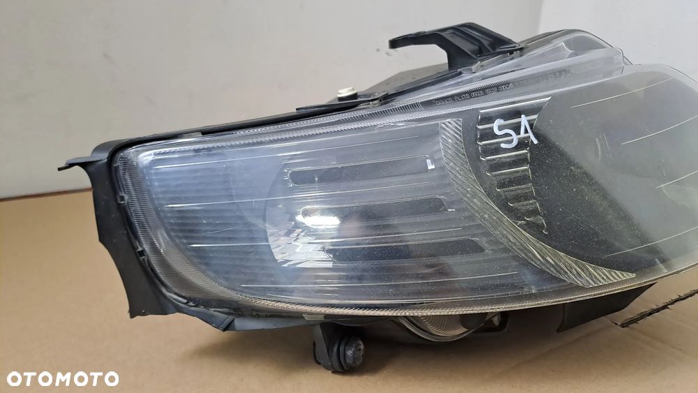 SAAB 9-5 LIFT 05-10 LAMPA PRAWA PRZÓD XENON 89101417-006-DX EU - 2
