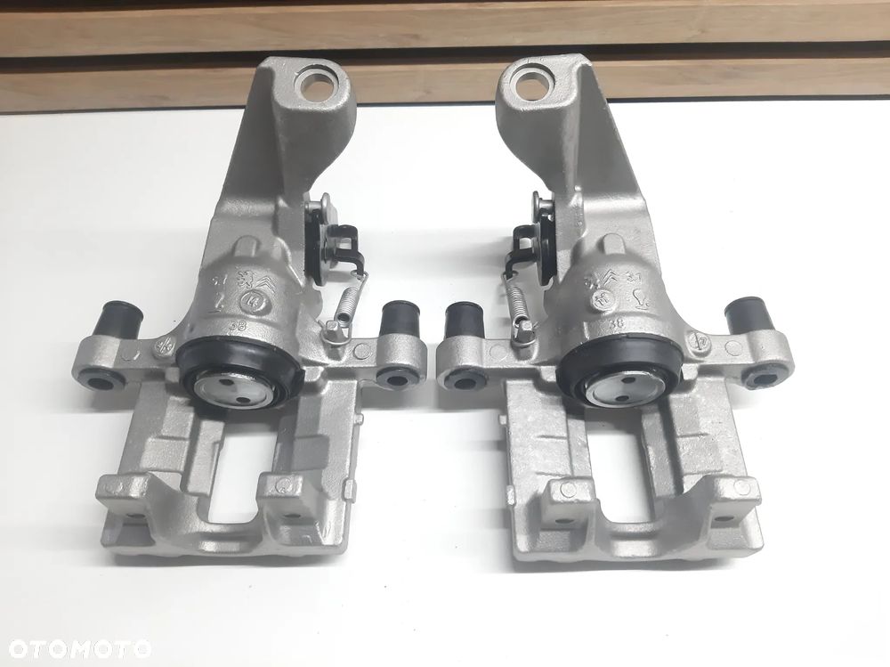 Zacisk tył lewy prawy peugeot 308 II T9 - 2