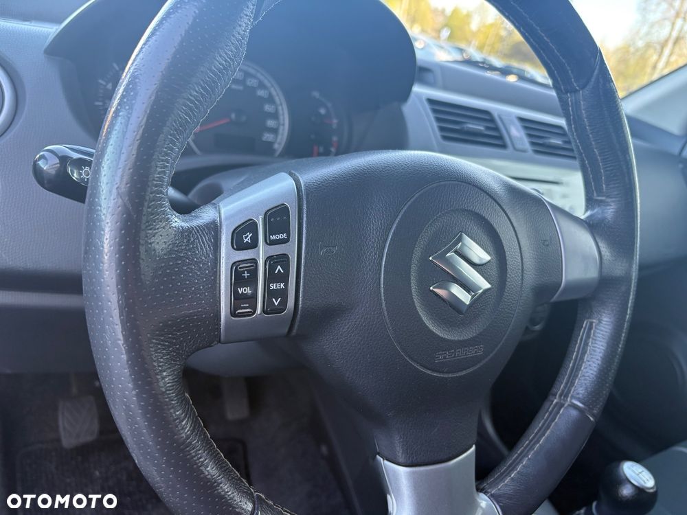 Suzuki Swift 1.3 Sakura - 14