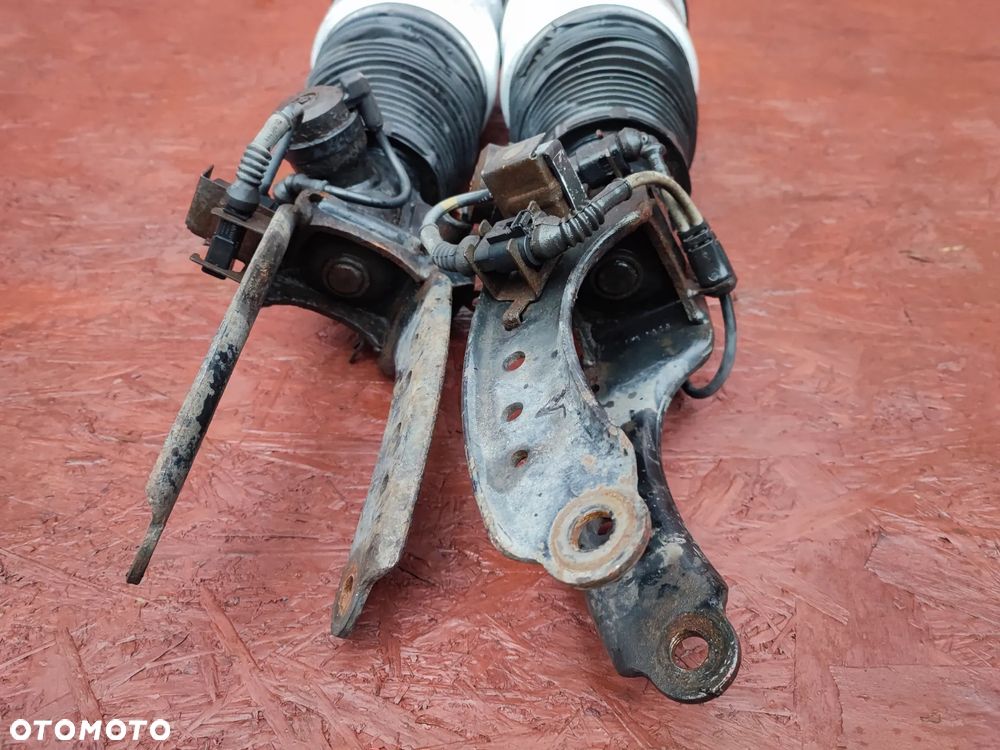 PORSCHE CAYENNE 7L5  ORYGINALNE AMORTYZATORY PRZEDNIE / MIECHY PNEUMATYKA LEWY / PRAWY W BDB STANIE O NR. 7L5412021AK / 0307210212 OEM - 9