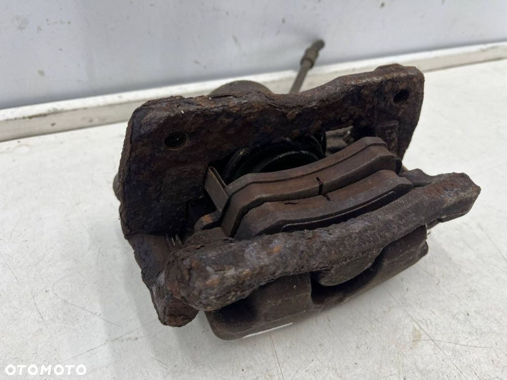 Zacisk hamulcowy Chrysler PT Cruiser 00-10r. 2.2 CRD prawy przedni jarzmo prawy przód - 8