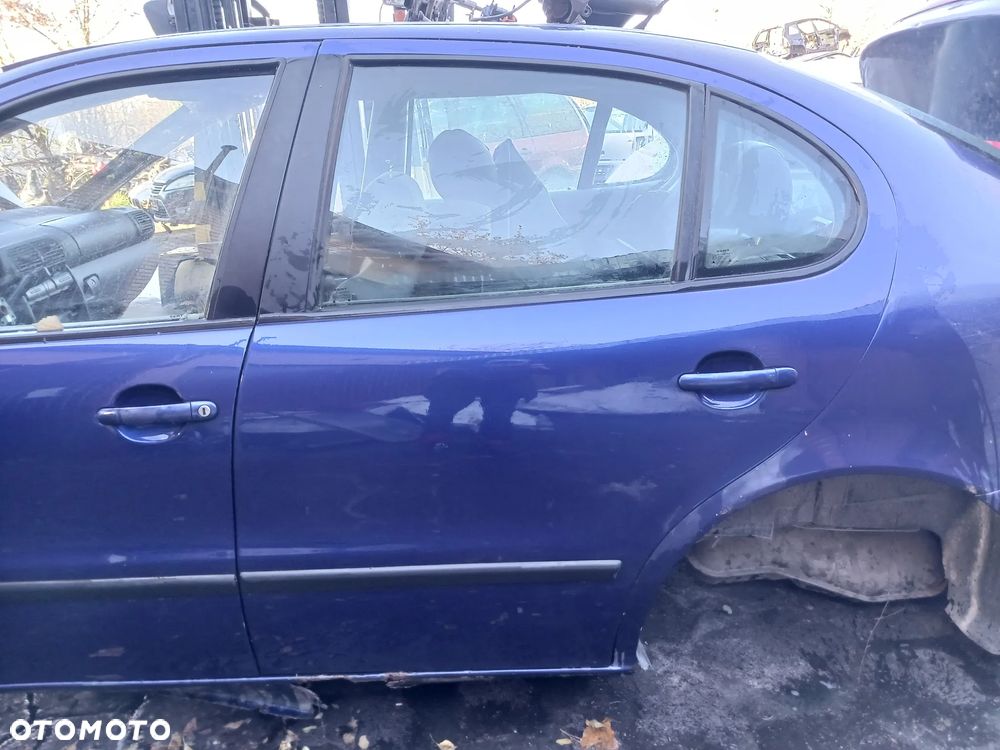 Drzwi lewy TYŁ Seat Toledo II 2 Leon kolor lakier LS5N niebieskie lewe tył tylne - 1