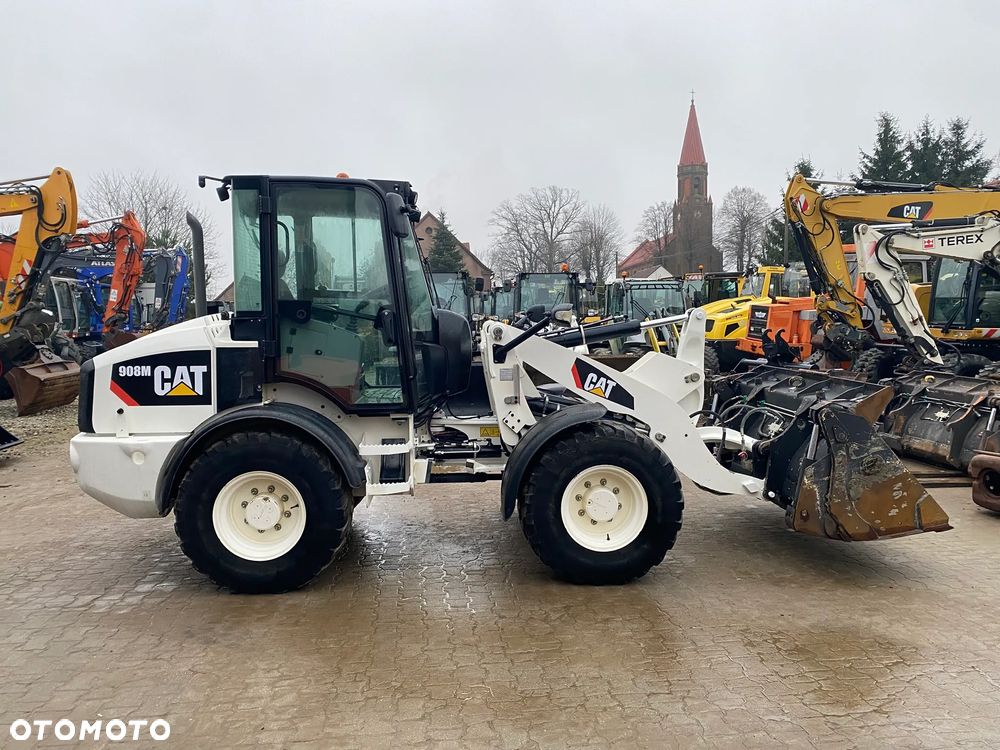 Caterpillar CAT 908M, 2020 ROK, 3400 MTH, ŁYŻKA OTWIERANA + WIDŁY, z NIEMIEC, - 2