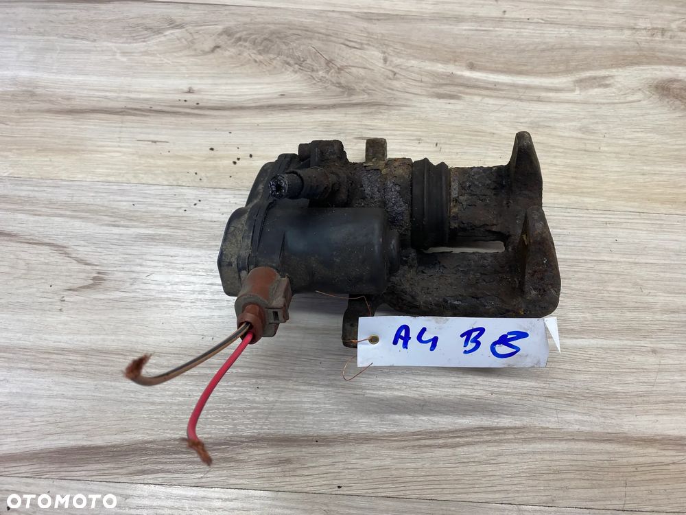 ZACISK HAMULCOWY ELEKTRYCZNY TYLNY  LEWY PRAWY AUDI A4 B8 - 5