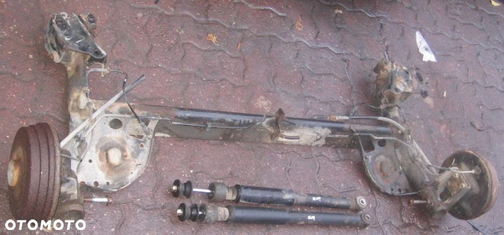 belka zawieszenie tył MICRA K12 amortyzator - 1