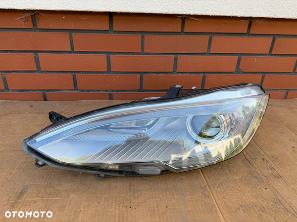 Tesla model S przed lift 12-15 bixenon lewy kompletny EU demontaz