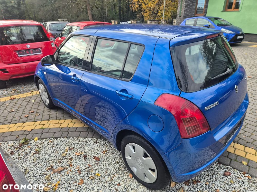 Suzuki Swift 1.3 Club - 4