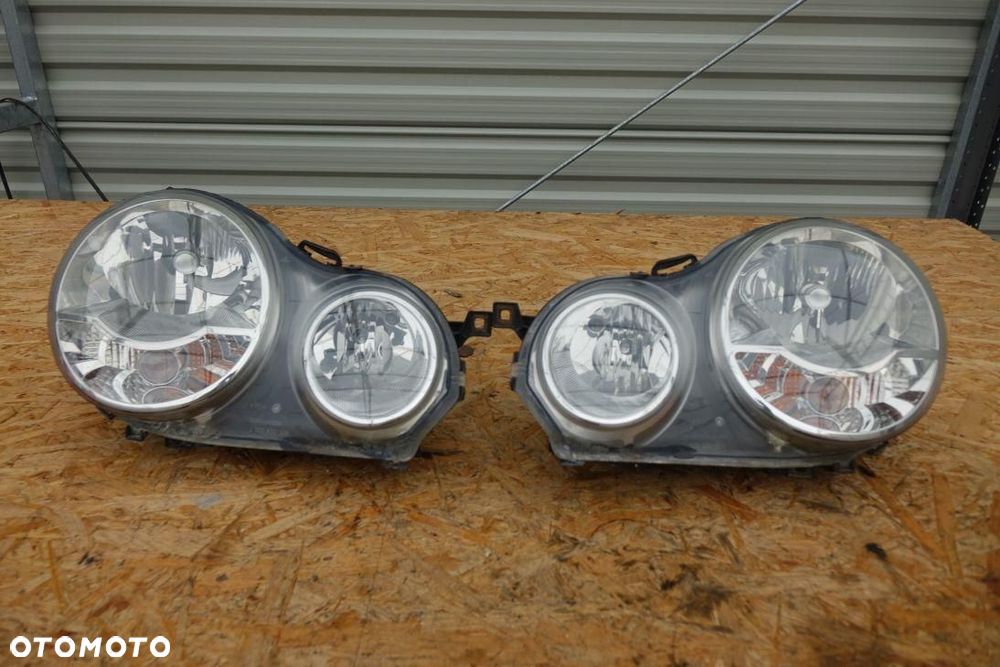 REFLEKTOR 2 LAMPY PRZÓD KPL EUROPA VW POLO 9N OKULAR 2342342 - 1
