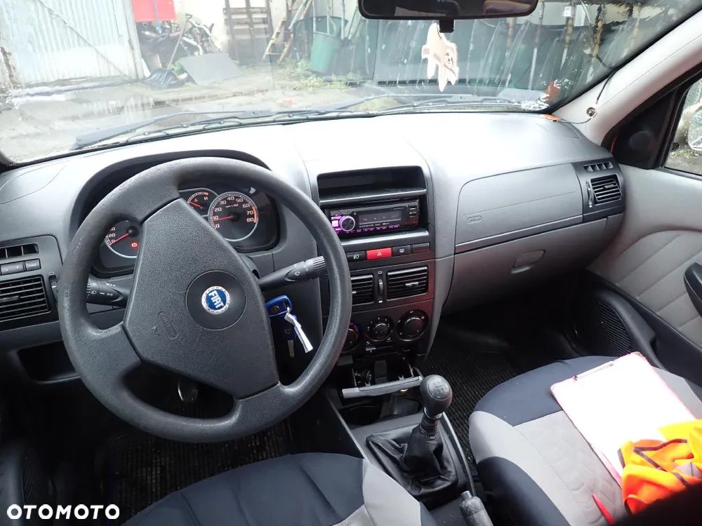 CZĘŚCI - Fiat Albea 1,4 77KM 350A1000 FILM LIFT SEDAN lakier 716 2006r. index - 9730 - 10