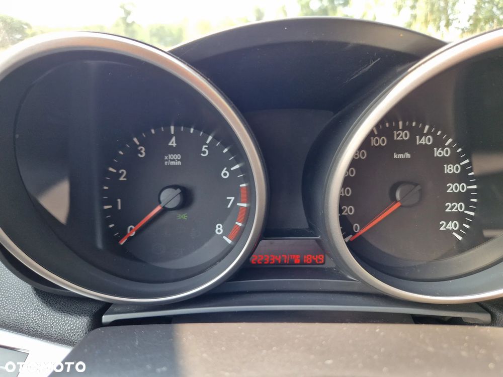 Mazda 3 2.0 Exclusive + - 9