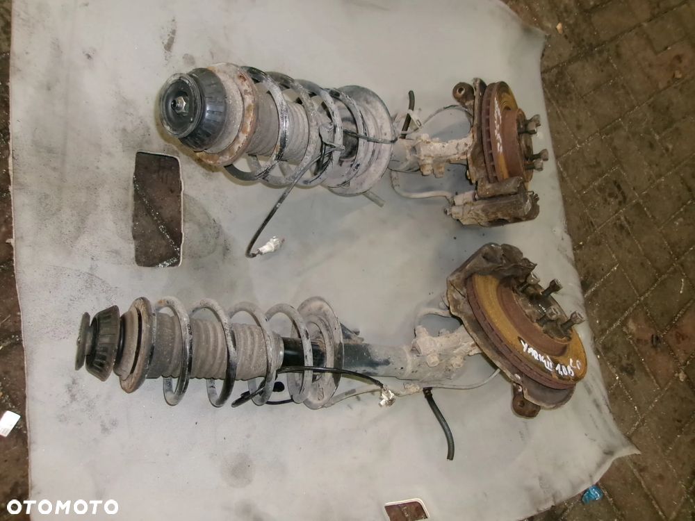 MCPERSON AMORTYZATOR ZWROTNICA TOYOTA YARIS II 1.0 BENZ - 1