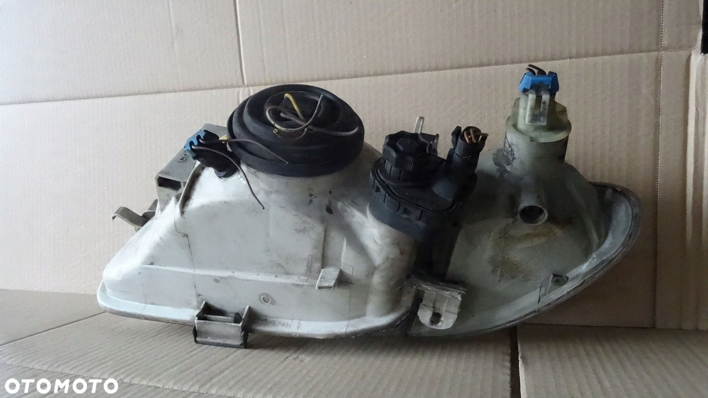ASTRA 1 I F REFLEKTOR PRAWY PRZÓD 90383783 - 8