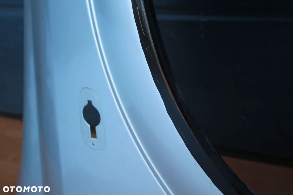 BŁOTNIK PRAWY PRZEDNI PRAWY PRZÓD OPEL ASTRA G II Z147 - 10