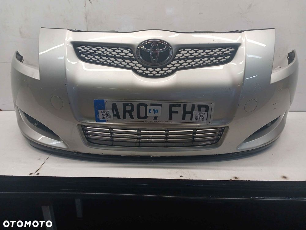 + ZDERZAK PRZÓD PRZEDNI TOYOTA AURIS I 1 1C0 SREBRNY HALOGENY - 1