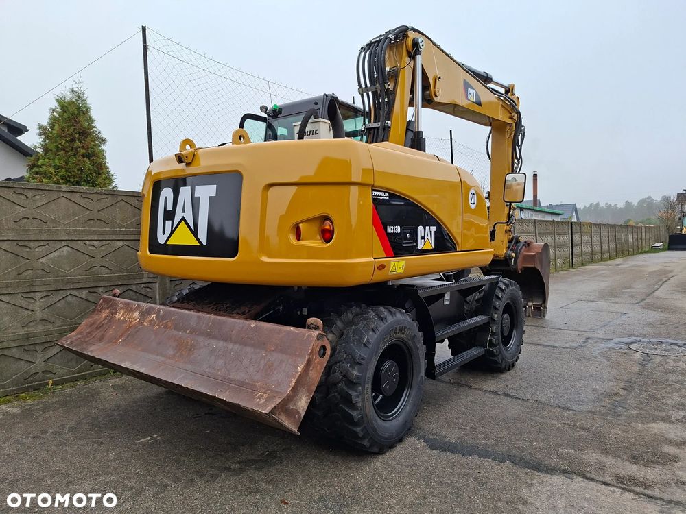Caterpillar CAT M 313 D - 8