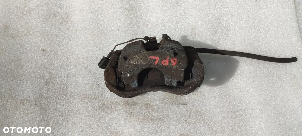 FIAT GRANDE PUNTO ZACISK HAMULCOWY LEWY PRZÓD - 1