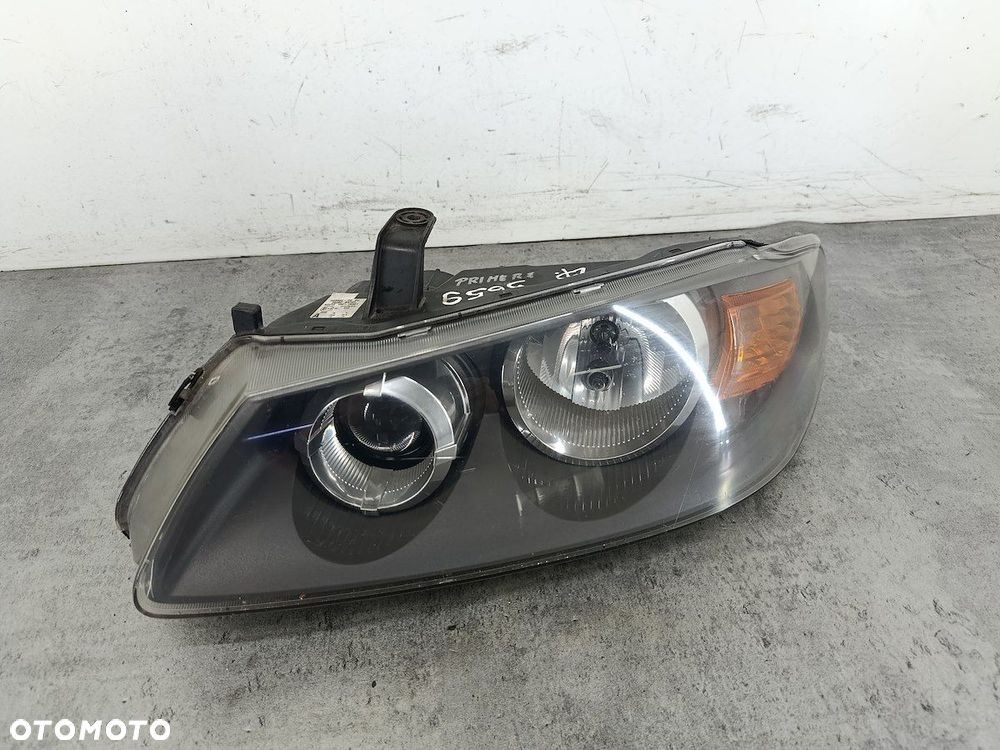 LAMPA PRZÓD LEWA NISSAN ALMERA II FL N16 H235GL-DE 100-16391  KOITO - 1
