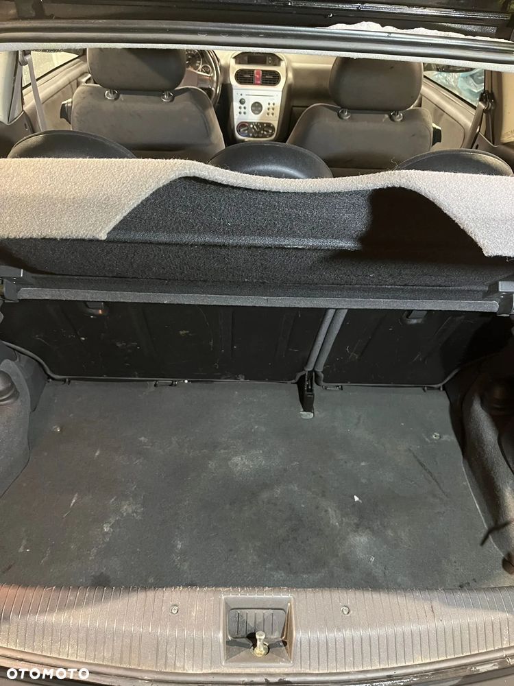 Opel Corsa 1.2 16V Enjoy - 8