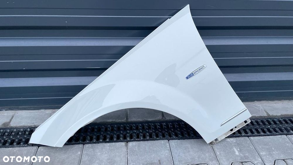 MERCEDES C W204 LIFT 11-14 BŁOTNIK LEWY KOLOR 650