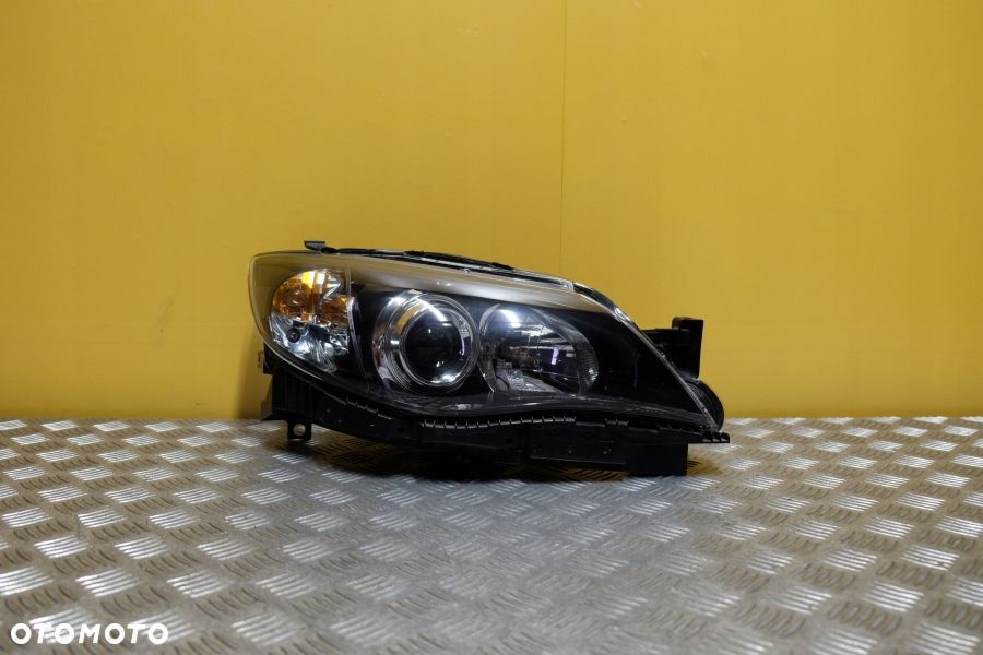 SUBARU IMPREZA GH 2007- REFLEKTOR LAMPA ZWYKŁA SOCZEWKOWA R EU - 1