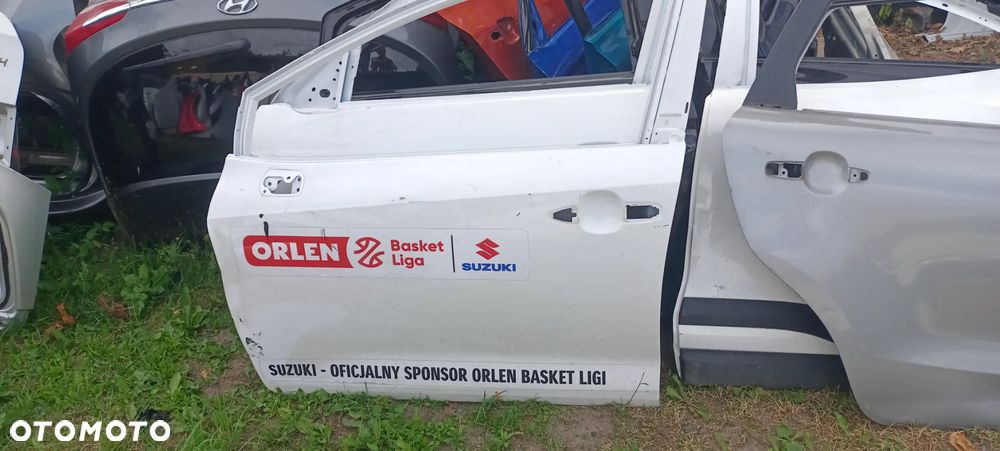 COROLLA E21 SUZUKI SWACE drzwi lewe przód przednie - 1