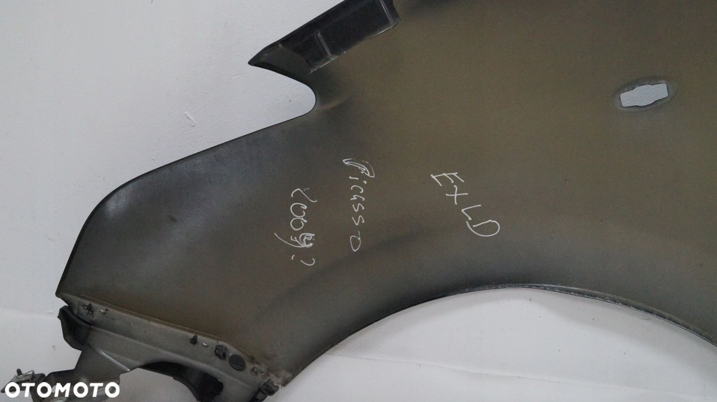 BŁOTNIK PRZEDNI PRAWY CITROEN C3 PICASSO EXLD 2009 - 11
