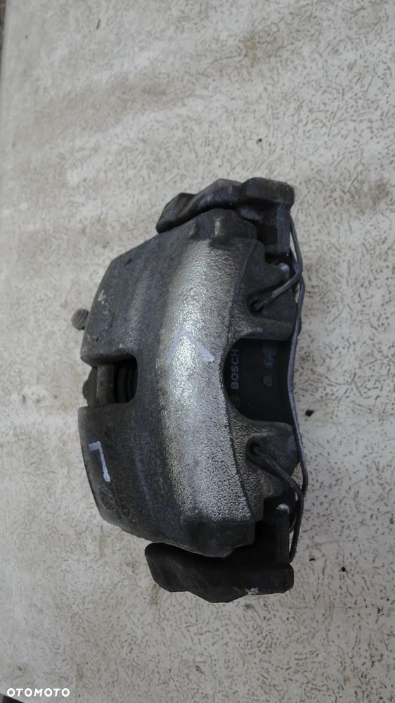 VW SCIROCCO ZACISK HAMULCOWY LEWY PRZÓD PRZEDNI KLOCKI 2.0TSI 08-17r - 2