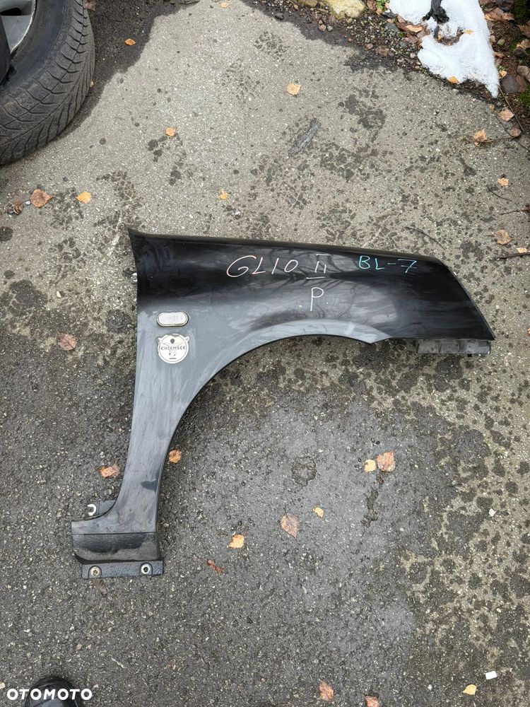 Błotnik przedni prawy RENAULT CLIO II  czarny metalik