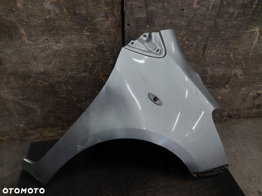 BŁOTNIK PRAWY PRZÓD TOYOTA YARIS II LIFT 1F8 - 1