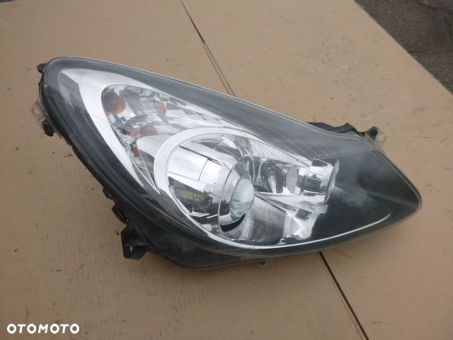 LAMPA PRAWY PRZÓD PRAWA PRZEDNIA OPEL CORSA D 06-11 - 14