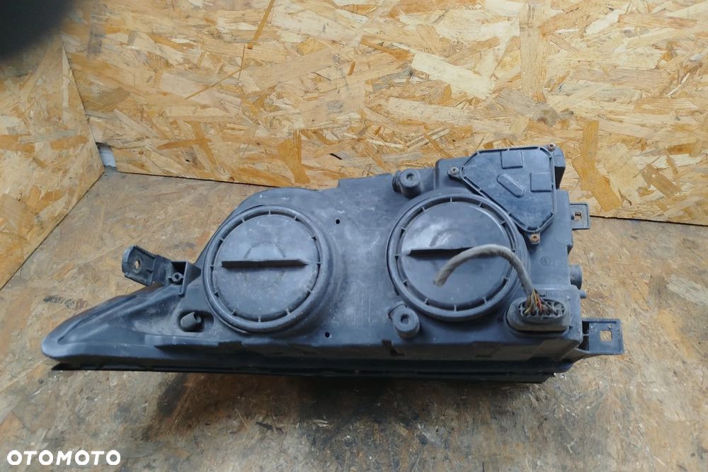 lampa przód lewa HELLA kompletna do lekkiej polerki do Vw Crafter I 06- 2E1941015, wszystkie uchwyty na miejscu - 5