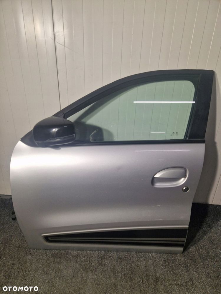 Drzwi przednie prawe/lewe Dacia Spring - lakier TEKQE - 1