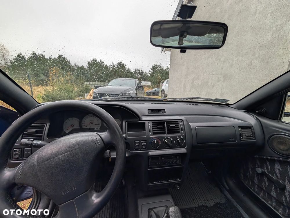 Ford Escort ver-1-6-16v-flair - 11