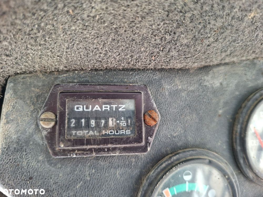 Bobcat 553 4X4 + Melroe Ingersoll-Rand 725S B/H - 20