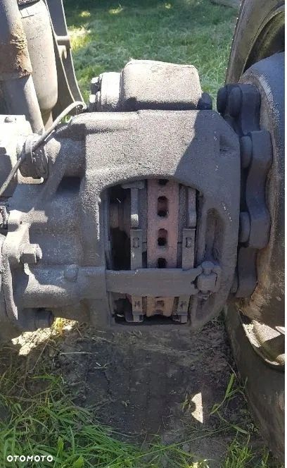 ZACISK HAMULCOWY PRAWY TYŁ DAF 55 LF KOŁA 22,5 - 1