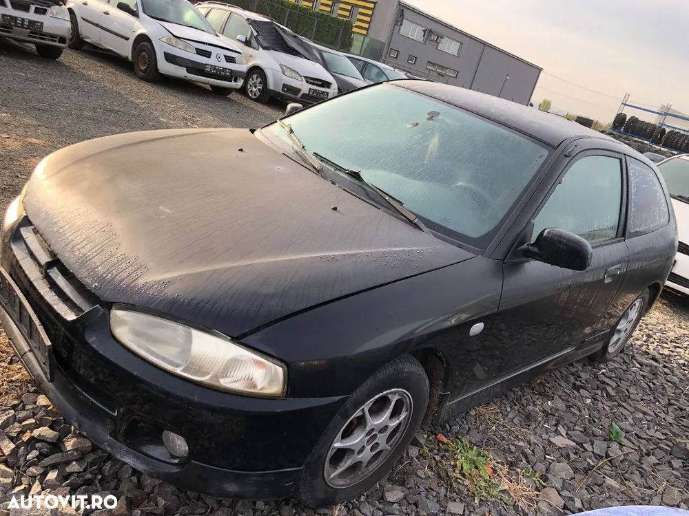Dezmembrez Mitsubishi Colt 2003 HATCHBACK 1.3i, COD MOTOR :4G13 - 2