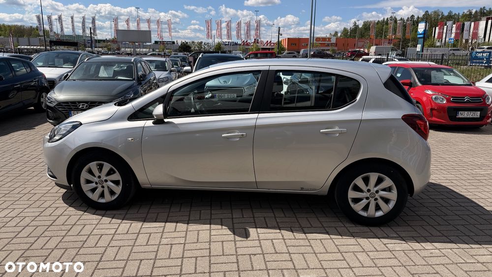 Opel Corsa 1.4 16V Cosmo - 11