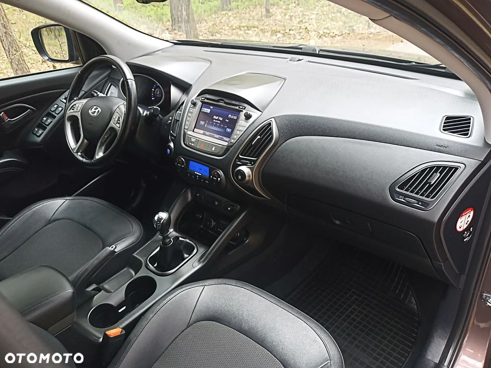 Hyundai ix35 1.7 CRDi 2WD blue Finale Gold - 14